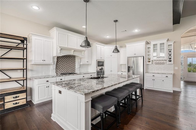 25072 W 114th Ct, Olathe, KS 66061 - kitchen featuring stainless steel fridge, white cabinets, built in microwave, and recessed lighting