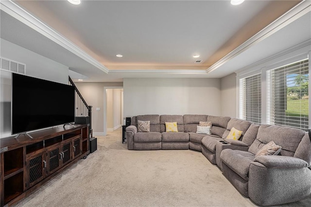 25072 W 114th Ct, Olathe, KS 66061 - living room featuring a tray ceiling, carpet floors, stairs, and recessed lighting