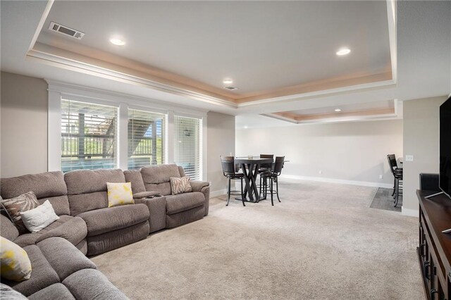 25072 W 114th Ct, Olathe, KS 66061 - living area featuring a tray ceiling, carpet floors, recessed lighting, and crown molding