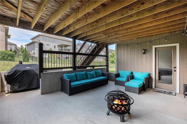 25072 W 114th Ct, Olathe, KS 66061 - view of patio featuring an outdoor living space with a fire pit, stairway, and area for grilling