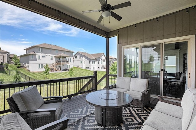 25072 W 114th Ct, Olathe, KS 66061 - wooden terrace with an outdoor hangout area, a ceiling fan, and a residential view