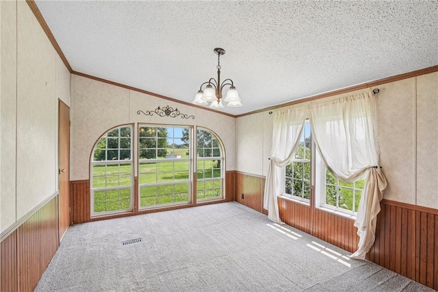 507 NW 165th Rd, Centerview, MO 64019 - unfurnished sunroom featuring healthy amount of natural light and a chandelier
