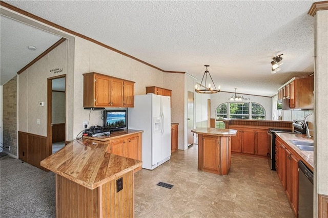 507 NW 165th Rd, Centerview, MO 64019 - kitchen with white fridge with ice dispenser, a peninsula, electric range, ornamental molding, and stainless steel dishwasher