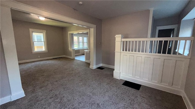 1114 N Liberty St, Independence, MO 64050 - empty room featuring carpet and baseboards