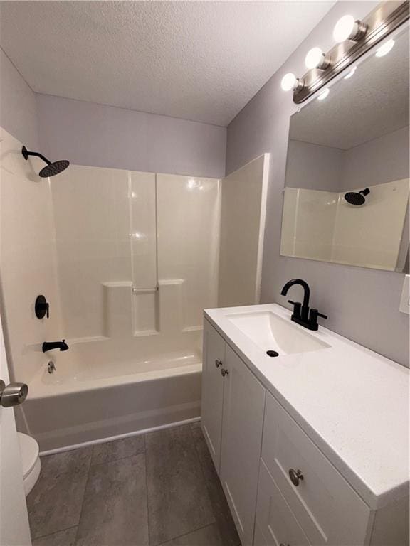 1114 N Liberty St, Independence, MO 64050 - bathroom featuring shower / bath combination, vanity, and a textured ceiling
