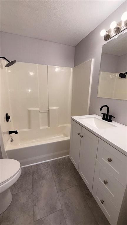 1114 N Liberty St, Independence, MO 64050 - full bath featuring vanity, washtub / shower combination, and a textured ceiling