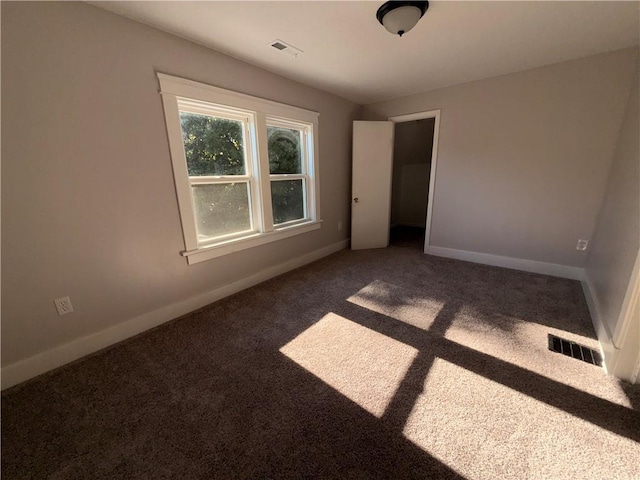 1114 N Liberty St, Independence, MO 64050 - unfurnished bedroom featuring carpet and baseboards