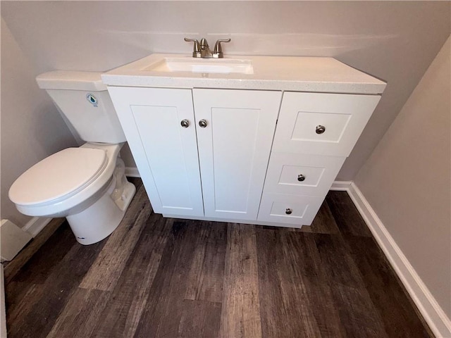 1114 N Liberty St, Independence, MO 64050 - bathroom with wood finished floors and vanity