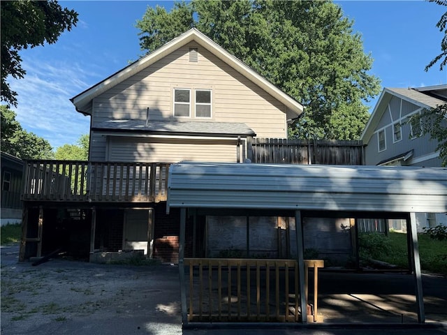 1114 N Liberty St, Independence, MO 64050 - back of property with a deck