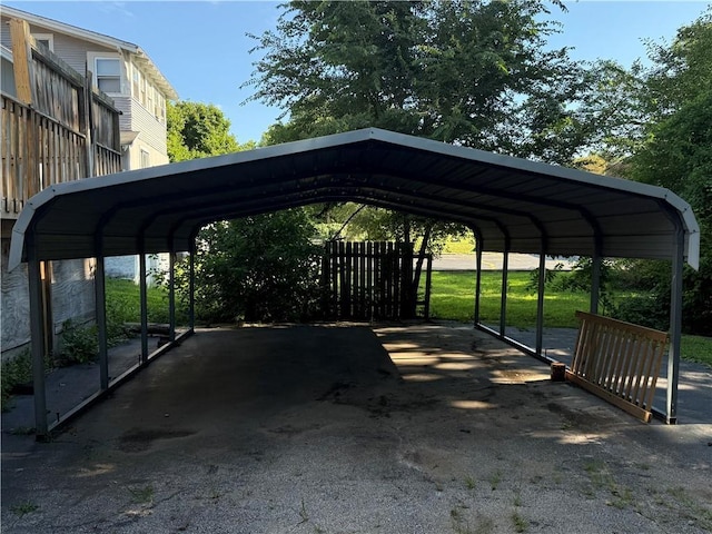 1114 N Liberty St, Independence, MO 64050 - view of vehicle parking with a carport