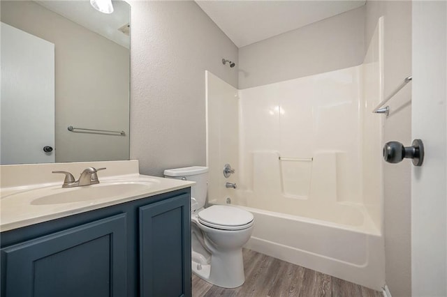 212 NW Parker Dr, Grain Valley, MO 64029 - full bathroom with wood finished floors, vanity, and bathing tub / shower combination
