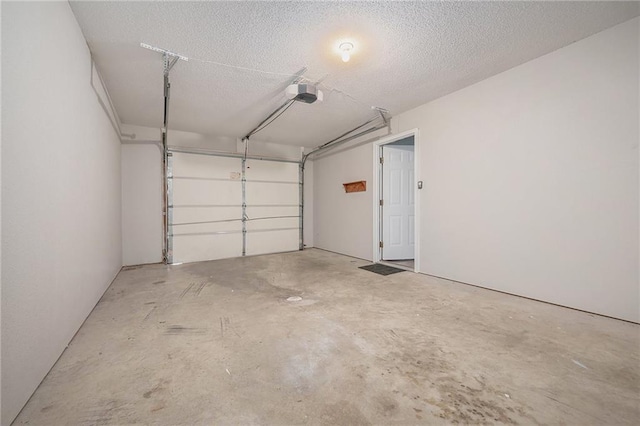 212 NW Parker Dr, Grain Valley, MO 64029 - garage featuring a garage door opener