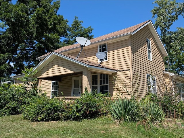 707 N 4th St, La Cygne, KS 66040 - view of side of home