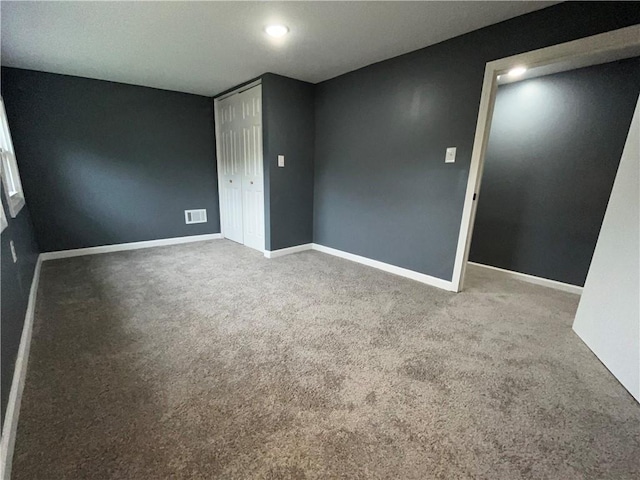 1027 Ohio Ave, Kansas City, KS 66102 - unfurnished room featuring carpet flooring and recessed lighting