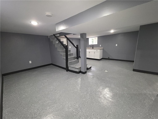 1027 Ohio Ave, Kansas City, KS 66102 - basement featuring baseboards and stairs