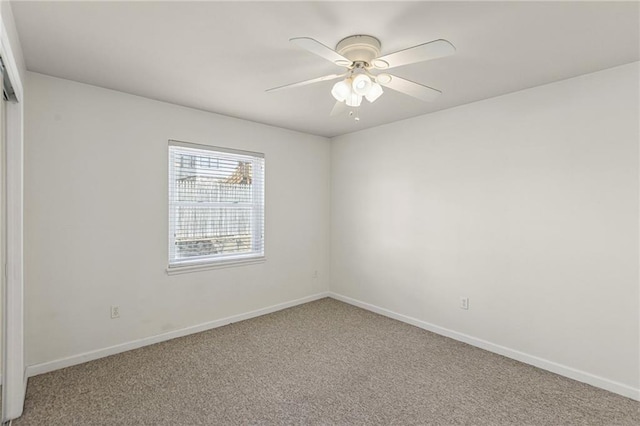 5006 Baltimore Ave Unit 205, Kansas City, MO 64112 - empty room featuring carpet and a ceiling fan