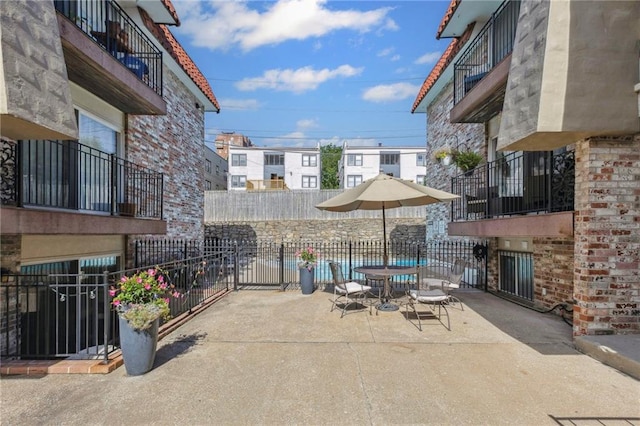 5006 Baltimore Ave Unit 205, Kansas City, MO 64112 - patio / terrace with a patio and outdoor dining space