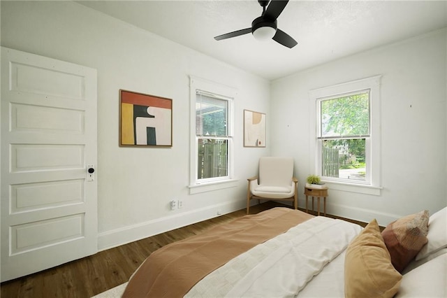 3808 Anderson Ave, Kansas City, MO 64123 - bedroom featuring wood finished floors and a ceiling fan