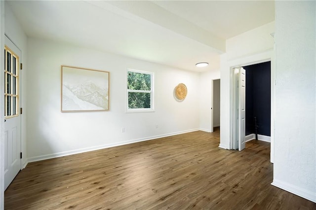 3808 Anderson Ave, Kansas City, MO 64123 - spare room with dark wood finished floors and baseboards