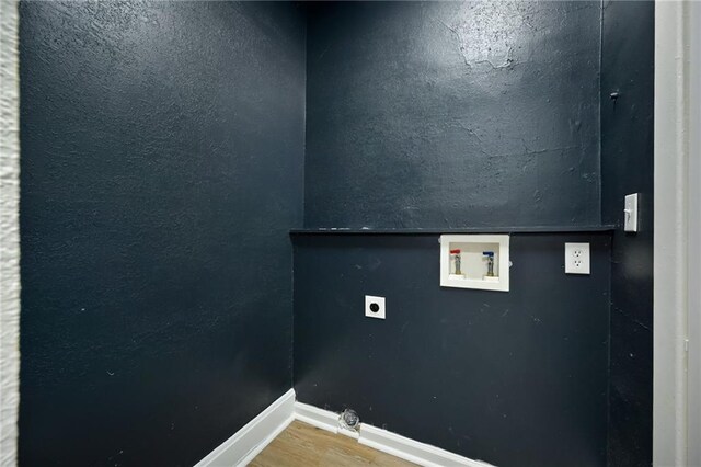 3808 Anderson Ave, Kansas City, MO 64123 - washroom featuring washer hookup, electric dryer hookup, and wood finished floors