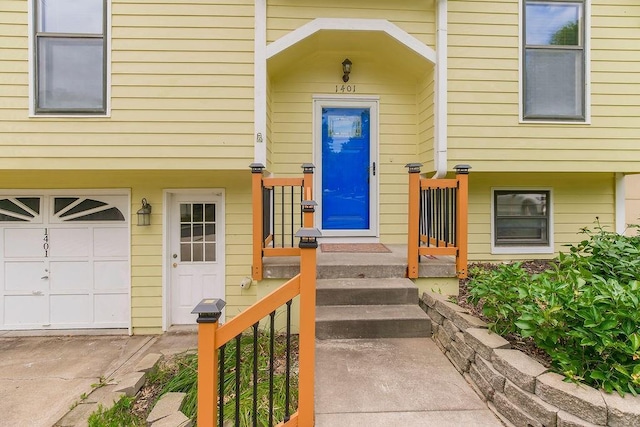 1401 NE Weddle Ln, Lees Summit, MO 64086 - property entrance with an attached garage