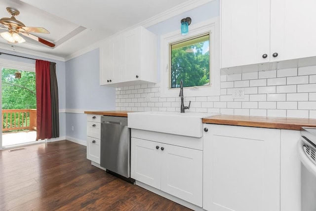 1401 NE Weddle Ln, Lees Summit, MO 64086 - kitchen with dishwasher, butcher block counters, backsplash, dark wood finished floors, and crown molding
