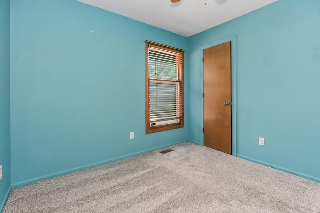 1401 NE Weddle Ln, Lees Summit, MO 64086 - unfurnished room with a ceiling fan and carpet floors