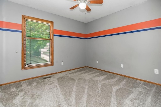 1401 NE Weddle Ln, Lees Summit, MO 64086 - unfurnished room with a ceiling fan and carpet flooring