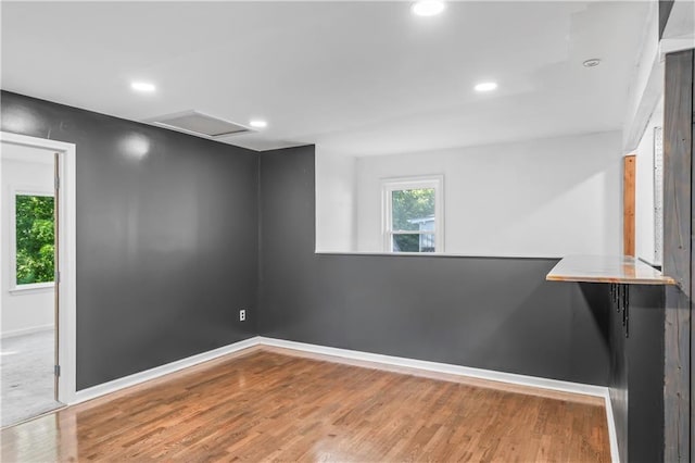 600 Ridgeview Ave, Kansas City, KS 66103 - spare room with attic access, wood finished floors, and recessed lighting