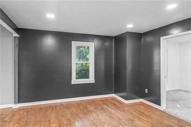 600 Ridgeview Ave, Kansas City, KS 66103 - empty room featuring wood finished floors and recessed lighting