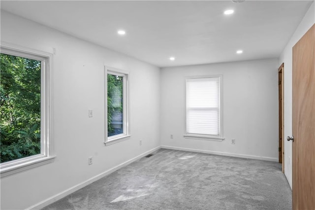 600 Ridgeview Ave, Kansas City, KS 66103 - spare room featuring plenty of natural light, carpet flooring, and recessed lighting