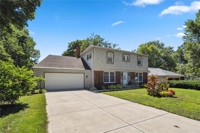 7211 Goodman St, Overland Park, KS 66204 - view of front of house featuring a garage, a front yard, driveway, a chimney, and brick siding