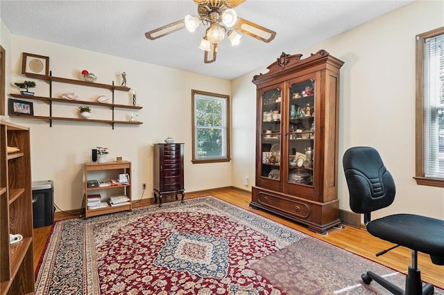 7211 Goodman St, Overland Park, KS 66204 - office area featuring wood finished floors and a ceiling fan