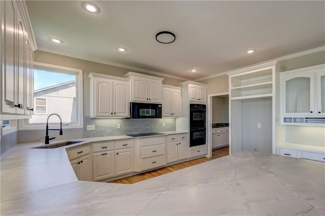 24108 W 67th Ter, Shawnee, KS 66226 - kitchen with black appliances, crown molding, backsplash, white cabinets, and open shelves