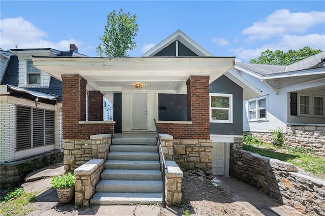 4036 Benton Blvd, Kansas City, MO 64130 - property entrance featuring brick siding