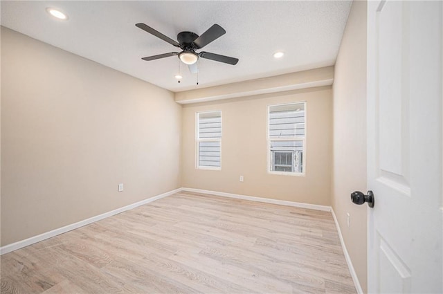4036 Benton Blvd, Kansas City, MO 64130 - unfurnished room featuring light wood-style flooring, ceiling fan, and recessed lighting