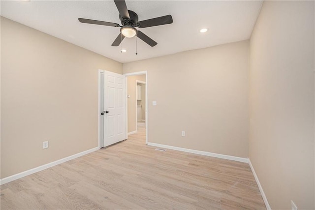 4036 Benton Blvd, Kansas City, MO 64130 - unfurnished room featuring light wood finished floors, ceiling fan, and recessed lighting