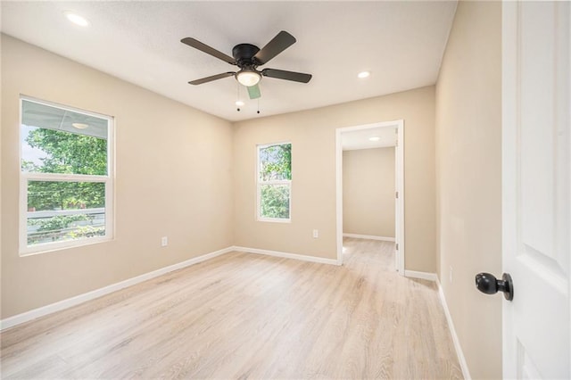 4036 Benton Blvd, Kansas City, MO 64130 - spare room featuring plenty of natural light, light wood-type flooring, a ceiling fan, and recessed lighting