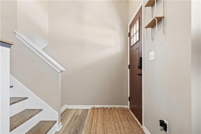 109 NW Whitlock Dr, Lees Summit, MO 64081 - entrance foyer featuring stairway and light wood-style floors