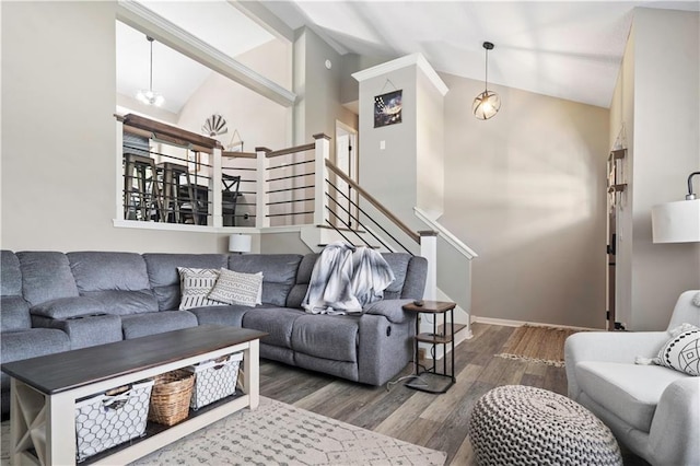 109 NW Whitlock Dr, Lees Summit, MO 64081 - living area featuring wood finished floors, beamed ceiling, and high vaulted ceiling