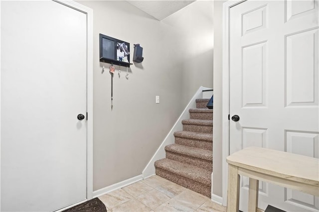 109 NW Whitlock Dr, Lees Summit, MO 64081 - staircase with baseboards