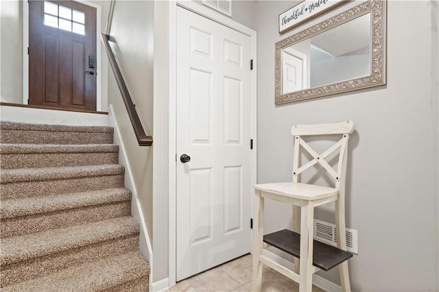 109 NW Whitlock Dr, Lees Summit, MO 64081 - stairs with baseboards and tile patterned floors