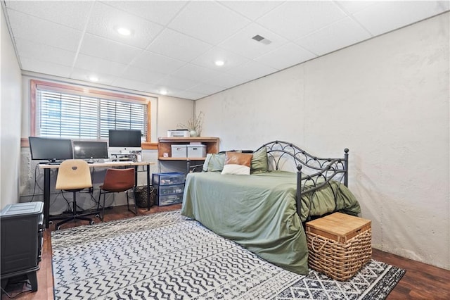109 NW Whitlock Dr, Lees Summit, MO 64081 - bedroom with wood finished floors, a drop ceiling, and a desk