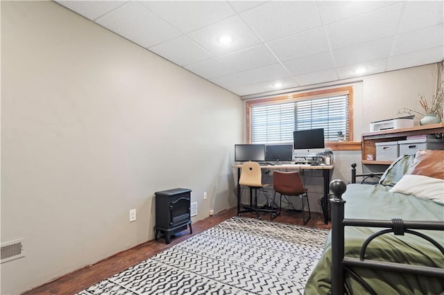 109 NW Whitlock Dr, Lees Summit, MO 64081 - office space with a wood stove, a drop ceiling, wood finished floors, and recessed lighting