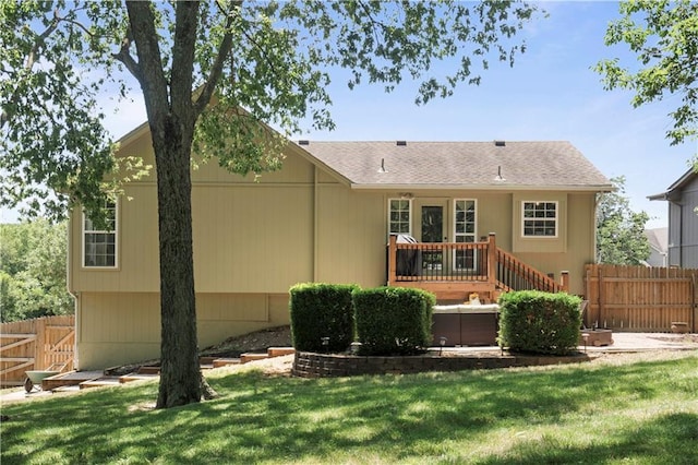 109 NW Whitlock Dr, Lees Summit, MO 64081 - back of property featuring a deck and roof with shingles