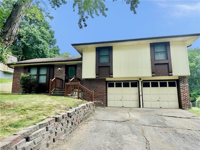 6110 NW 51st Ter, Kansas City, MO 64151 - split level home featuring a garage, brick siding, driveway, and a front yard