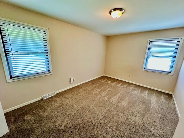 6110 NW 51st Ter, Kansas City, MO 64151 - spare room with carpet