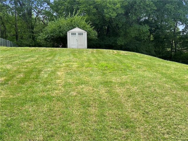 6110 NW 51st Ter, Kansas City, MO 64151 - view of yard featuring a storage unit