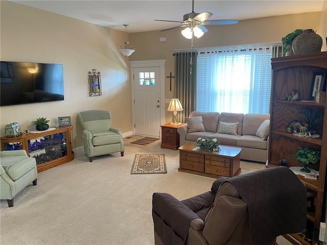 5205 University Ave, Saint Joseph, MO 64503 - carpeted living area with ceiling fan and baseboards