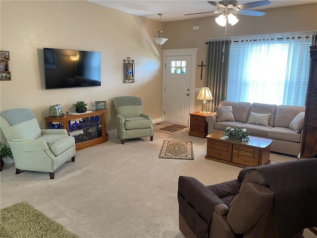 5205 University Ave, Saint Joseph, MO 64503 - living room with a ceiling fan and carpet
